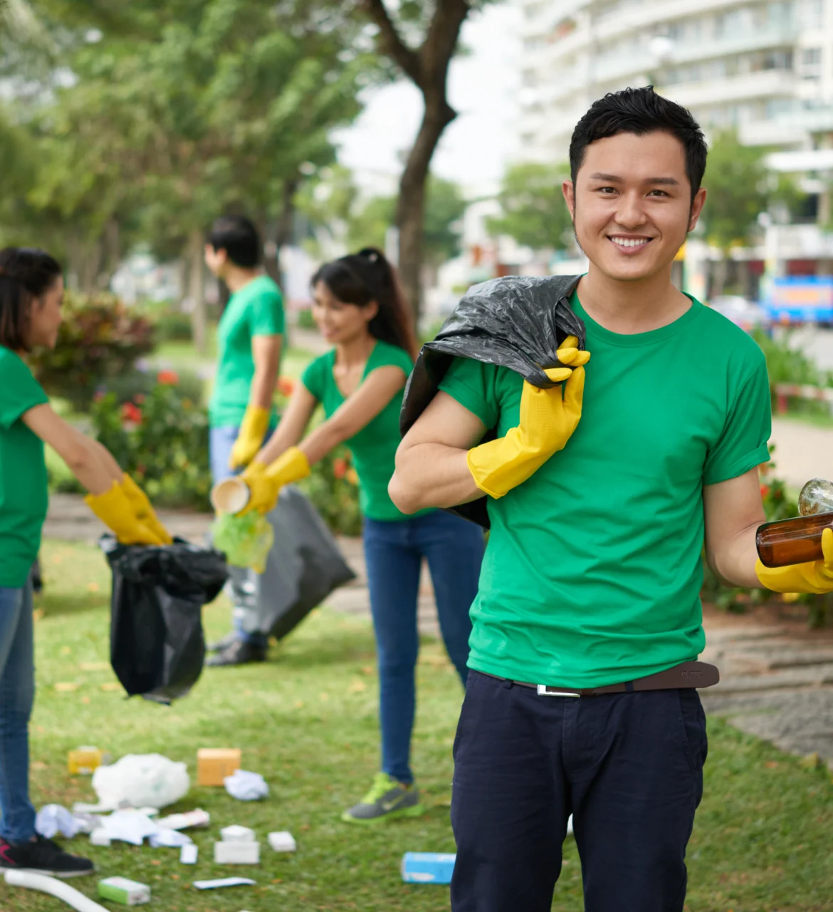 Asian volunteers cleaning Environment